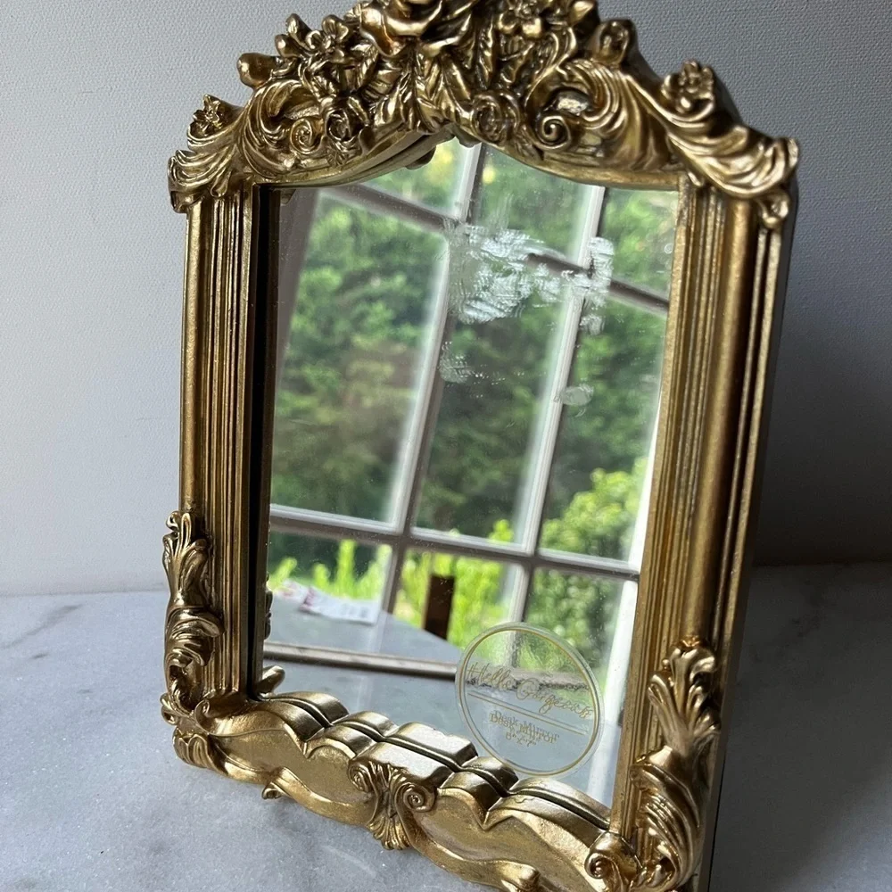 Ornate gold floral table top mirror 6”x9”